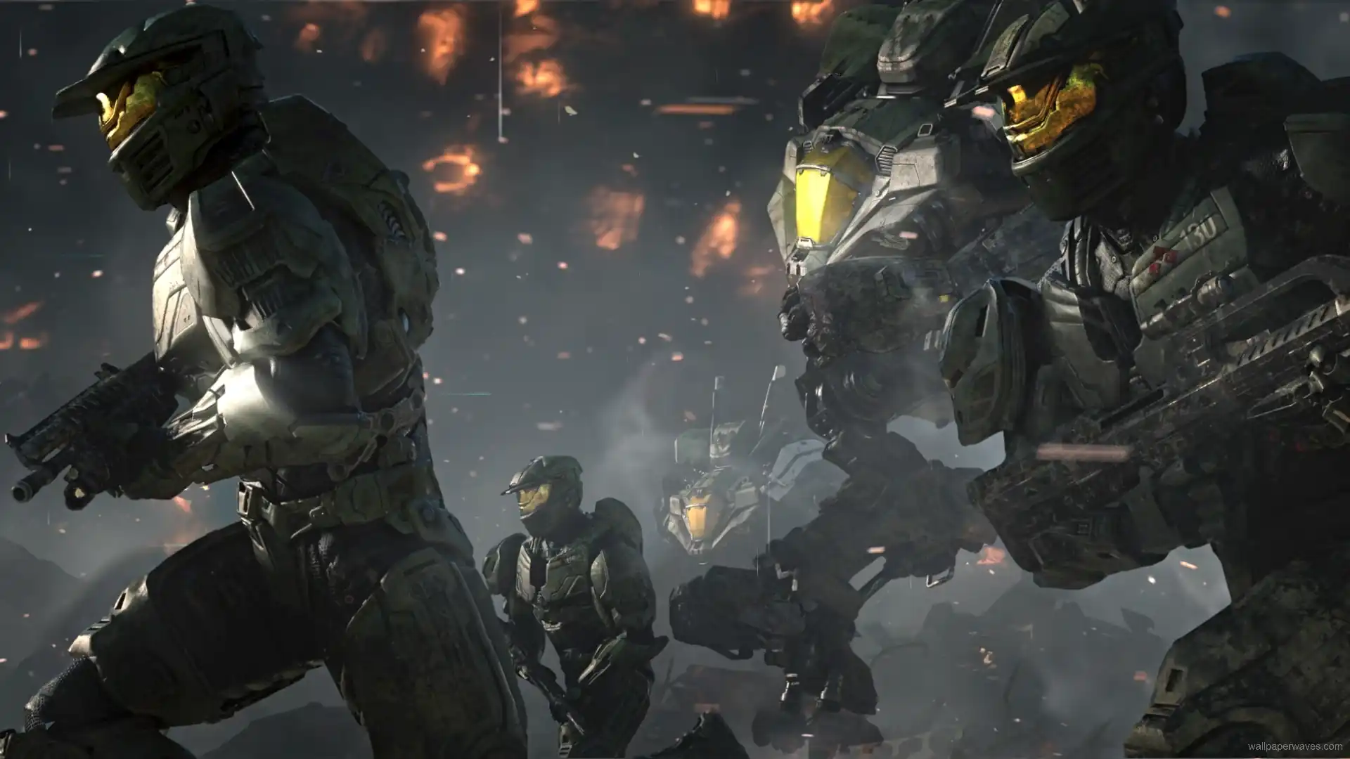 Spartan soldiers and Cyclops mechs from Halo Wars 2 charging through battlefield flames and debris in a sci-fi warfare wallpaper.