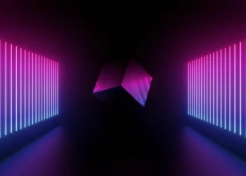 Pulsating neon cube floating inside a glowing abstract tunnel with vibrant electric blue and purple light patterns – wallpaper.