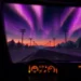POV view from car driving through a snowy forest highway at night with vibrant northern lights glowing in the sky – wallpaper.