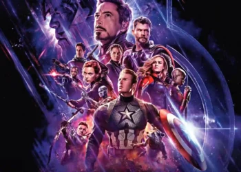 Marvel Avengers Endgame heroes standing together with glowing effects, cinematic background with dust, sparks, and iconic superhero poses – live wallpaper.