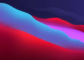 Abstract macOS Big Sur inspired gradient with flowing blue, pink, and orange colors blending smoothly in a minimalistic live wallpaper