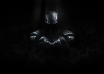 Dark Knight Shadow Batman Live Wallpaper 1 Dark shadowy Batman figure emerging from darkness with glowing bat symbol on chest live wallpaper