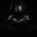 Dark Knight Shadow Batman Live Wallpaper 10 Dark shadowy Batman figure emerging from darkness with glowing bat symbol on chest live wallpaper