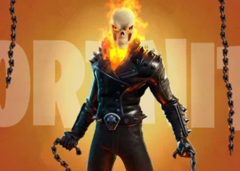 Ghost Rider Fortnite skin standing in flaming hellfire with glowing skull, spiked leather jacket, burning chains, and an intense orange inferno background wallpaper.