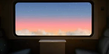 Calm sunset view from a train window with clouds and twilight sky in warm colors live wallpaper