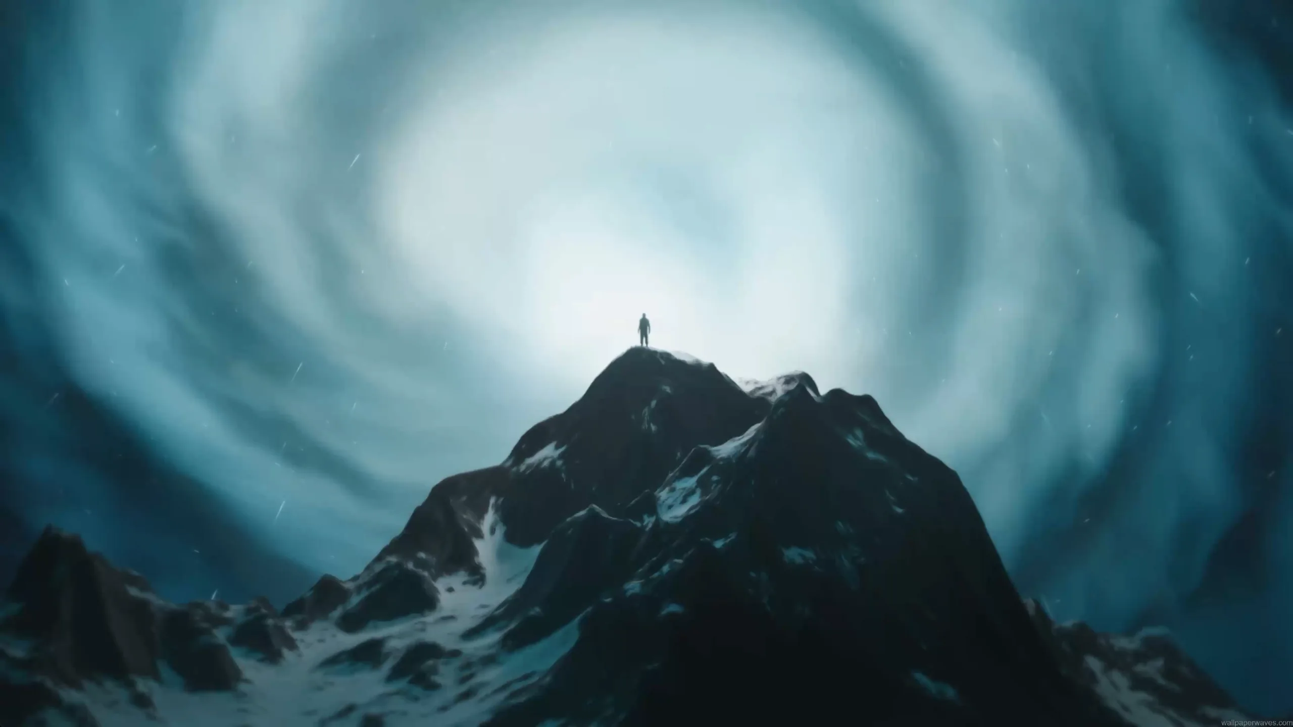 Lone figure standing on snowy mountain peak under massive swirling cosmic vortex sky with dramatic blue tones and atmospheric sci fi landscape wallpaper