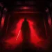 Darth Vader Dark Corridor Live Wallpaper 10 Darth Vader standing in a dark red corridor with glowing red lightsaber and intense Sith aura Star Wars wallpaper