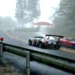 Two drift cars racing on rainy mountain road in Forza Horizon inspired street racing wallpaper