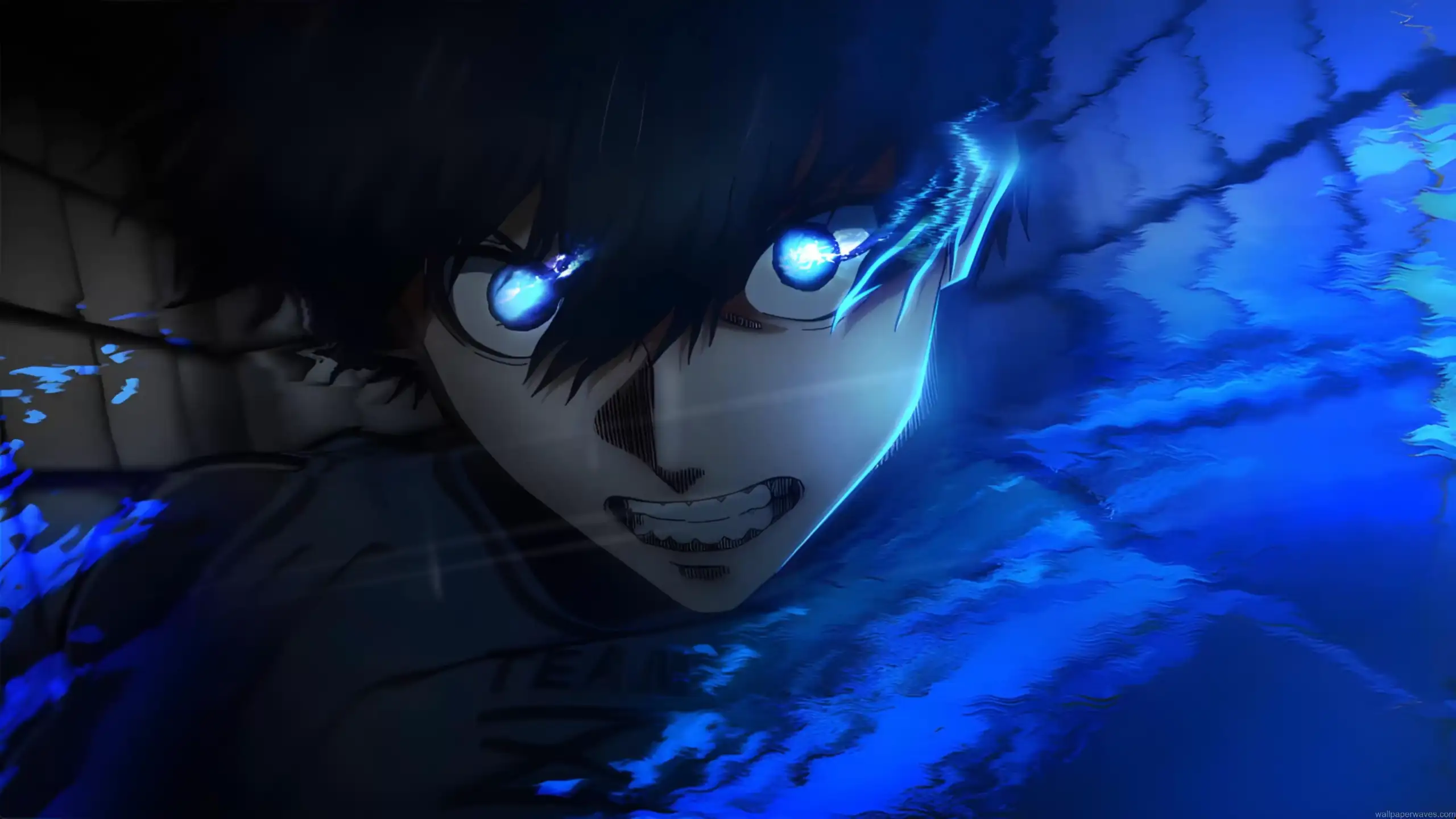 Isagi Yoichi from Blue Lock with glowing blue eyes and intense energy aura in dark anime scene wallpaper