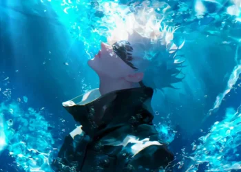 Satoru Gojo underwater surrounded by glowing blue water and light rays from Jujutsu Kaisen anime wallpaper