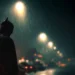 Batman standing in heavy rain beneath glowing streetlights on a dark Gotham street in Batman Dark Knight Rain Live Wallpaper.