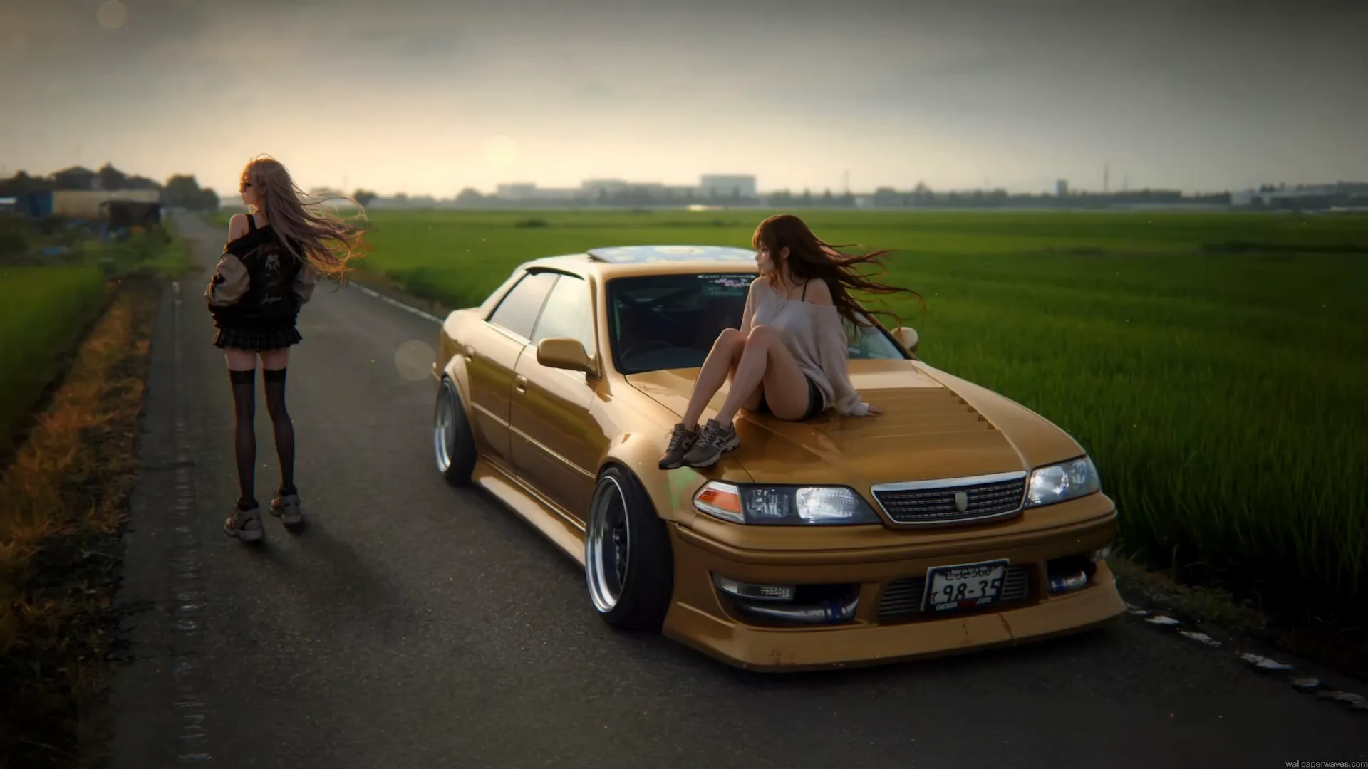 Anime girls relaxing with a lowered golden JDM sedan on a peaceful countryside road at sunset live wallpaper.