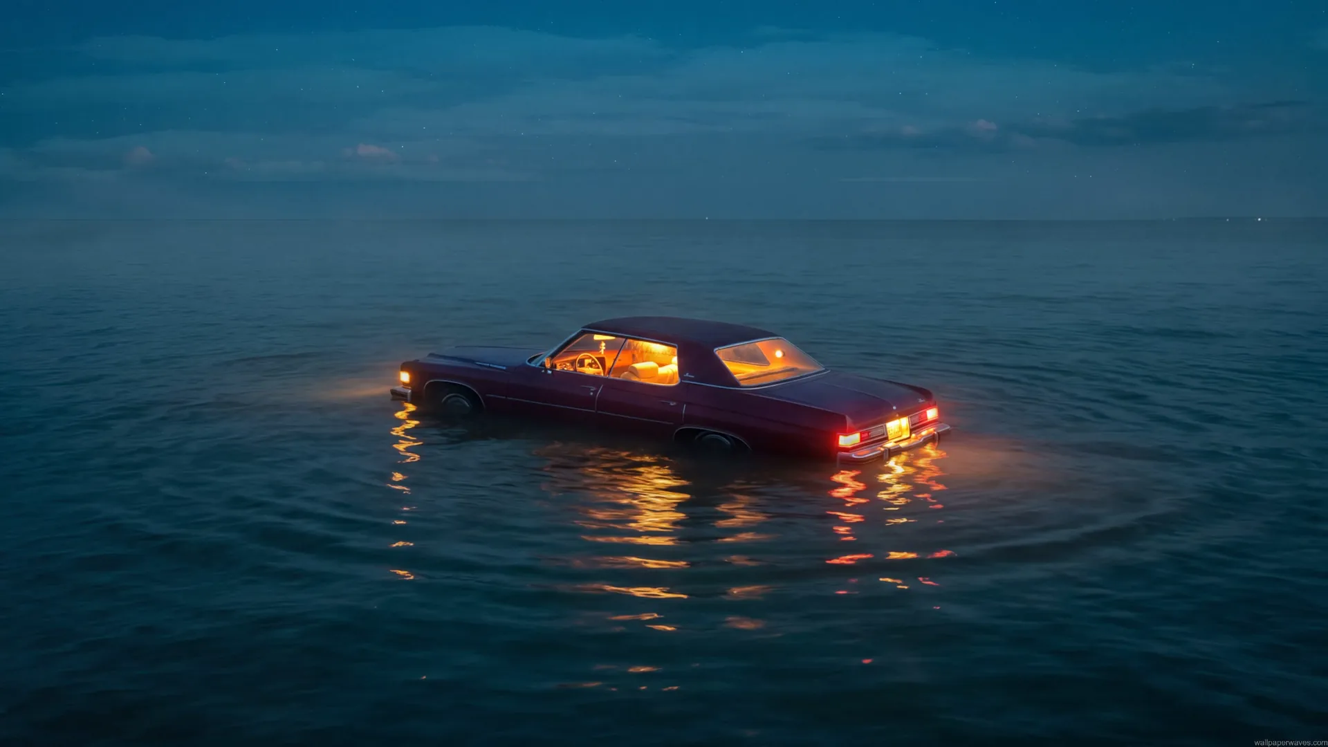 Vintage car floating peacefully in the ocean under a calm night sky with glowing interior lights live wallpaper.