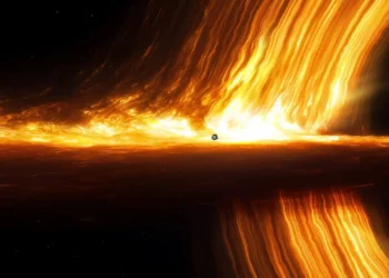 Supermassive Black Hole Live Wallpaper 2 Supermassive black hole with a glowing golden accretion disk and blazing plasma streams in deep space live wallpaper.