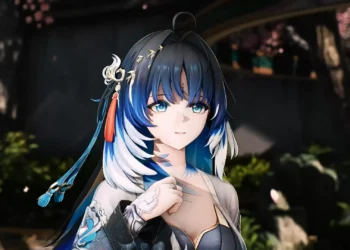 Yangyang smiling peacefully beneath cherry blossoms with flowing blue hair in Wuthering Waves live wallpaper.