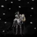 Grimm and Alice Black Souls 2 Live Wallpaper 10 Grimm carrying Alice surrounded by glowing eyes in Black Souls 2 dark fantasy live wallpaper