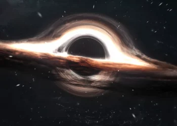 Interstellar black hole with glowing accretion disk, gravitational lensing, and stars in deep space live wallpaper.