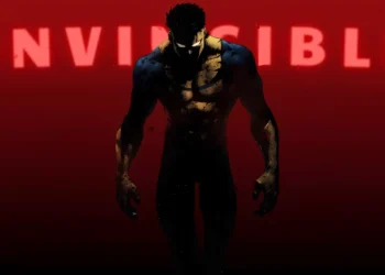 Invincible Mark Grayson Dark Red Live Wallpaper 1 Invincible Mark Grayson standing in shadow against a dark red background live wallpaper.