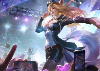 Ahri performing on stage in her K/DA ALL OUT outfit with glowing fox tails, confetti, and cheering fans in League of Legends live wallpaper