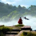 Fantasy warrior holding a flag while facing a massive floating island with ancient ruins above misty clouds live wallpaper
