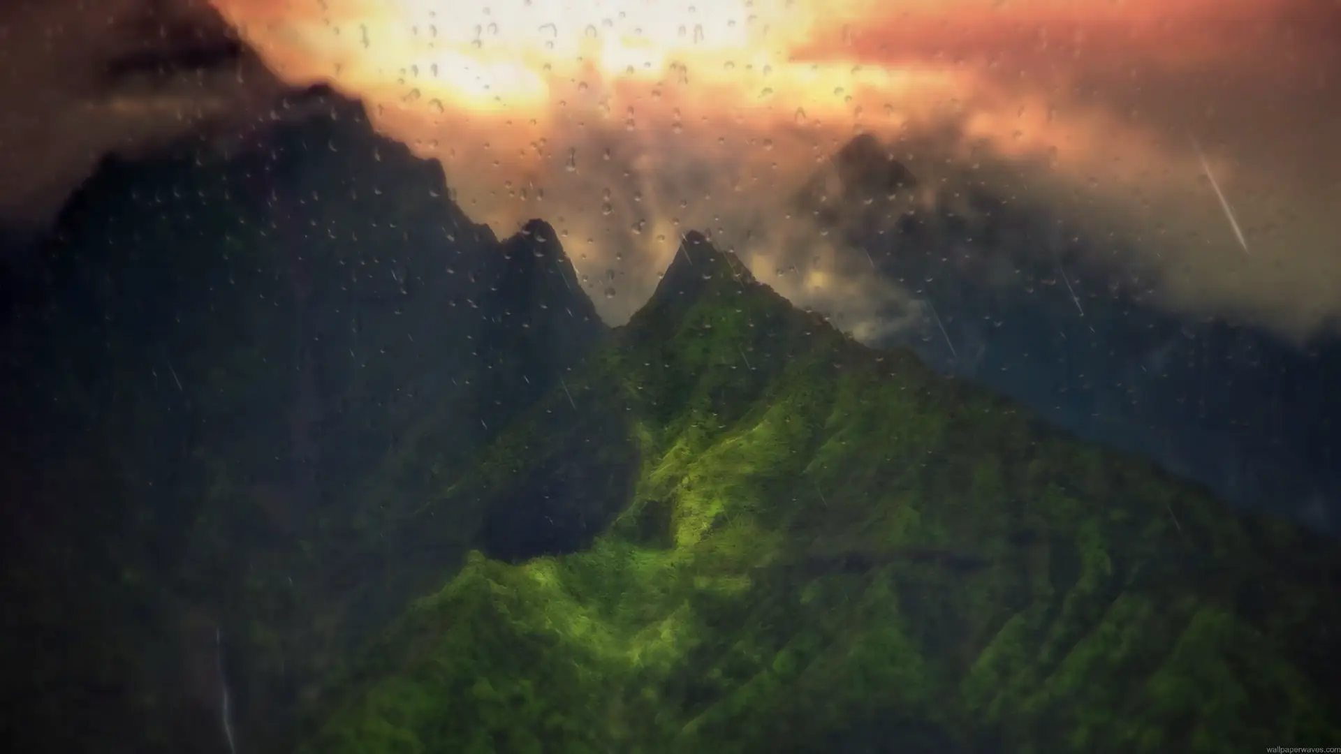 Green mountains covered in rain and mist beneath dramatic clouds and a glowing orange sunset live wallpaper