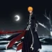 Ichigo Kurosaki from Bleach holding a red-black sword beneath a crescent moon in a dark starry landscape live wallpaper