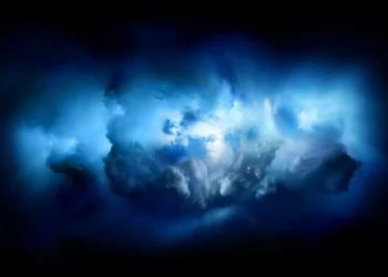 iMac Pro Blue Cloud Abstract Live Wallpaper 1 iMac Pro blue cloud abstract with glowing cyan smoke against a deep black background live wallpaper