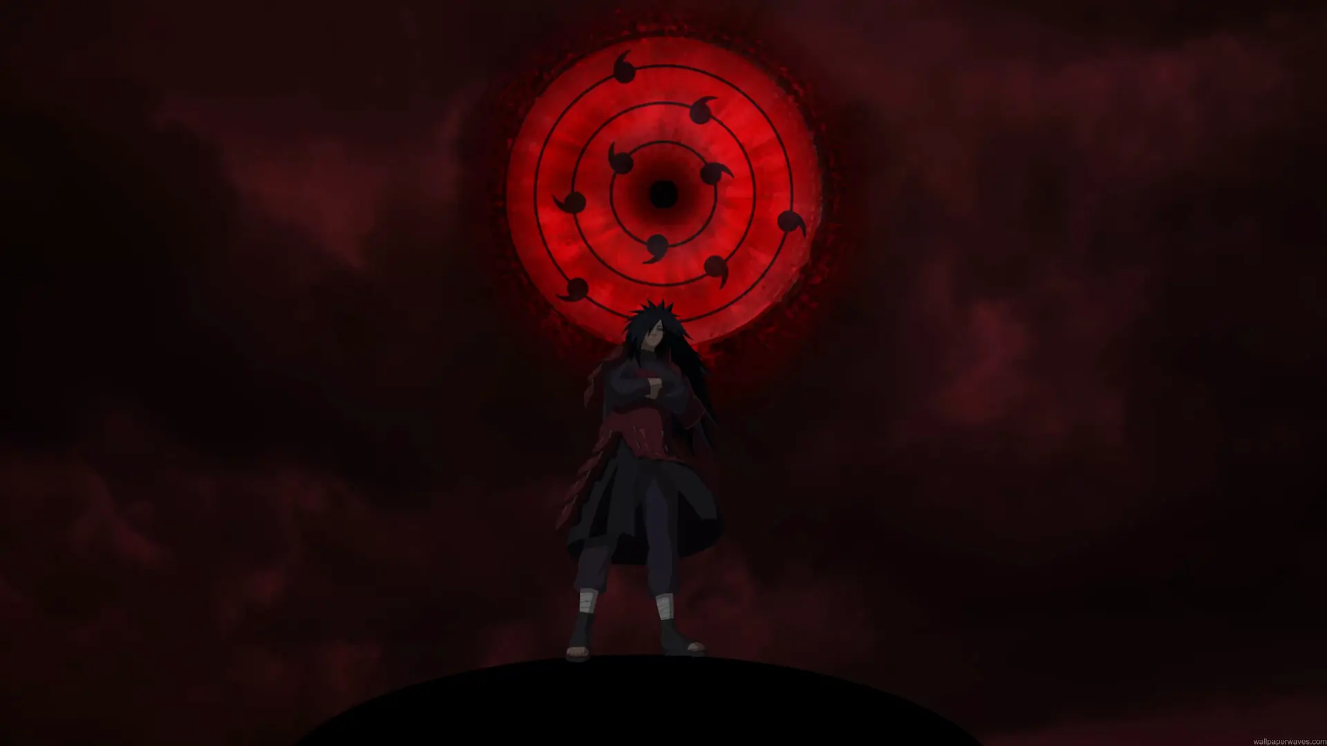 Madara Uchiha standing beneath a massive glowing red Sharingan during Infinite Tsukuyomi in Naruto Shippuden live wallpaper