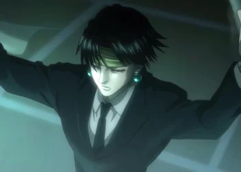 Chrollo Lucilfer from Hunter x Hunter wearing a black suit, forehead bandage, and turquoise earrings with arms outstretched under eerie green lighting in an anime live wallpaper.