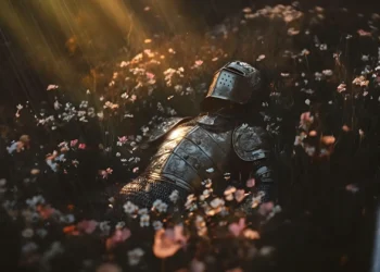 Fallen Knight in Flower Field Rain Live Wallpaper 1 Fallen medieval knight in engraved silver armor lying among pink and white wildflowers under gentle rainfall, illuminated by warm golden sunlight in a dark cinematic fantasy landscape live wallpaper