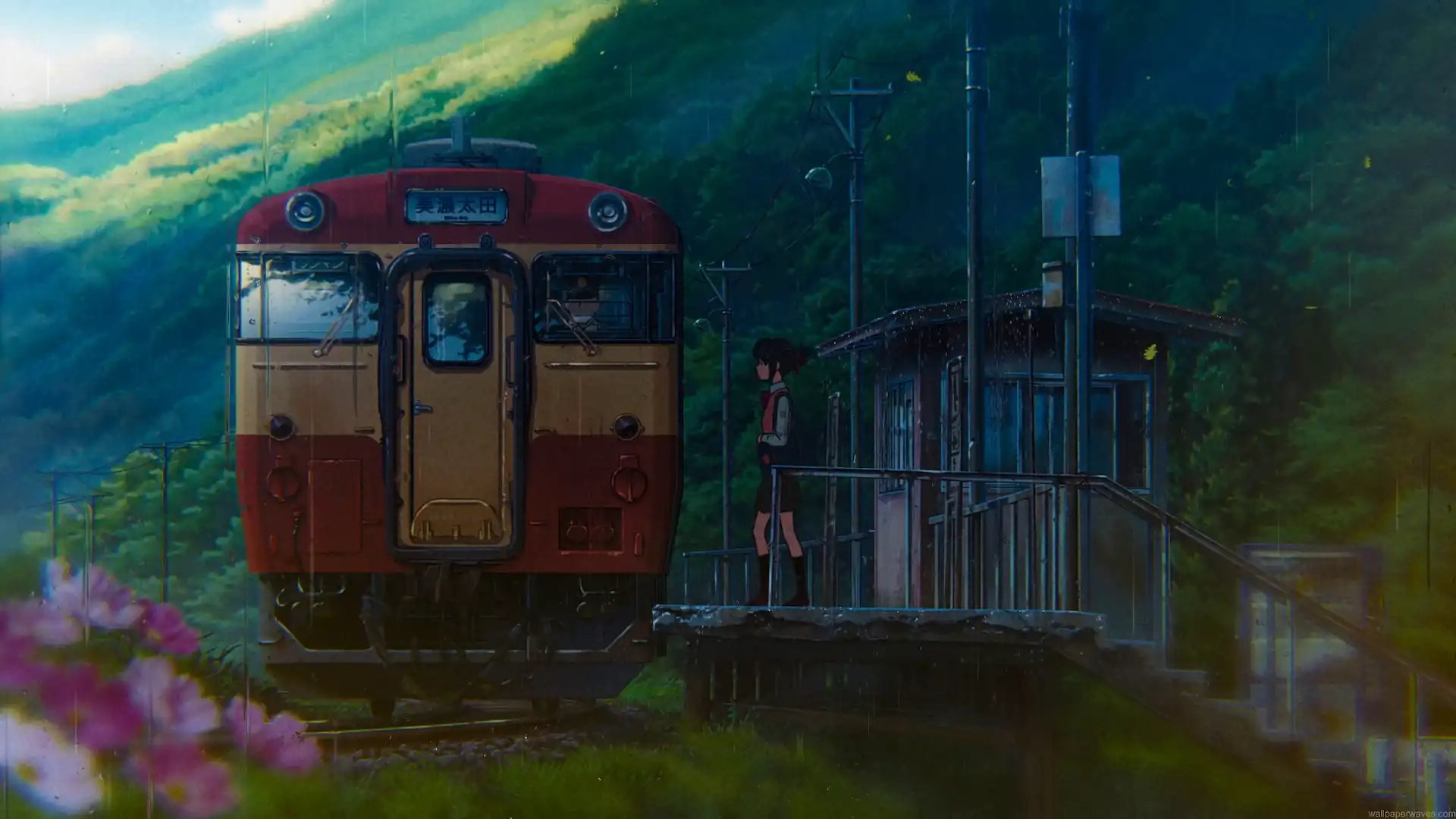 Your Name Kimi no Na wa anime-inspired rainy countryside train station featuring a vintage red and cream train, a young girl standing on the platform, lush green mountains, colorful flowers, and gentle rainfall in a peaceful anime live wallpaper.